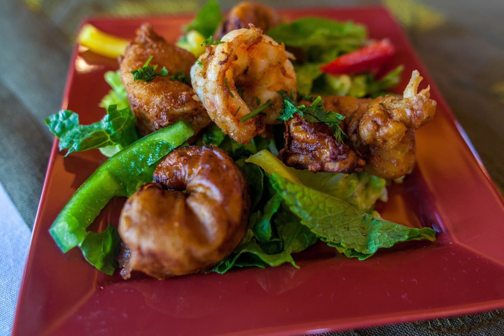 Beignets de crevettes — marinated fried jumbo shrimp