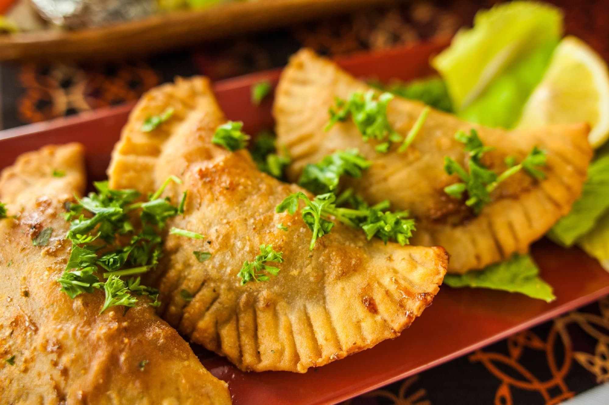 Fatayas — savory pastries stuffed with fish or beef