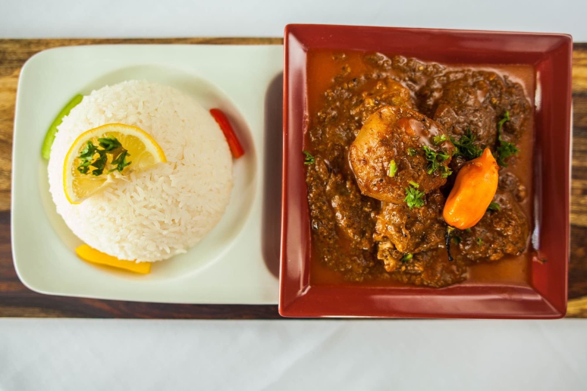 Lamb maffe — lamb in creamy peanut sauce with white rice